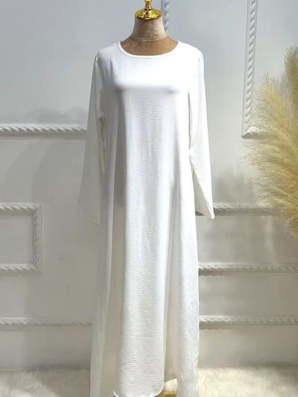 Abaya blanche sur mannequin