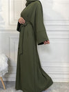 Abaya kimono en vert kaki, vue de côté, avec une coupe ample et des manches larges