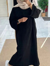 Femme en abaya velours noir