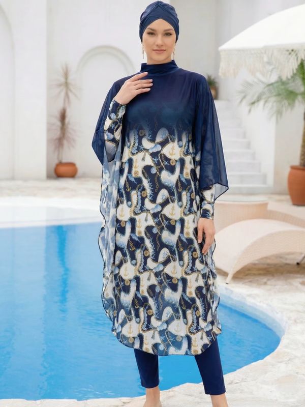 Burkini hijab bleu marine à décor d'ancres dorées, manches cape en voile, vue de face avec bonnet-turban marine