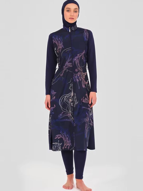 Burkini long bleu nuit à fleurs lilas et roses tracées au trait, glissière centrale et col montant, vue de face