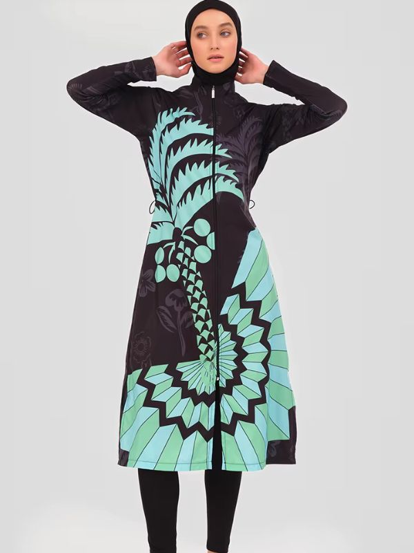Burkini long noir à palmier turquoise et soleil géométrique vert menthe, vue de face avec hijab noir