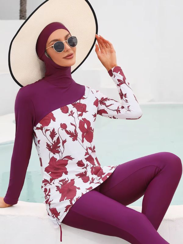 Une femme porte un burkini de couleur violet