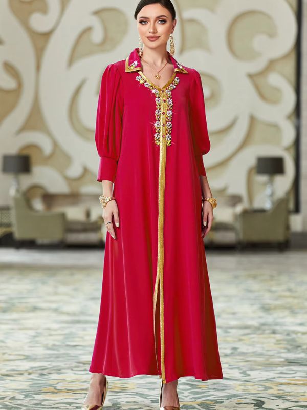 Caftan marocain mariage rouge Grenade de Rabat porté de face, col chemise strassé et galon doré central