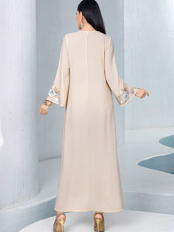 Djellaba marocaine beige, vue de dos, couture centrale, manches évasées à poignets brodés et ourlet sans décor