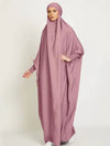 Femme qui porte un jilbab violet