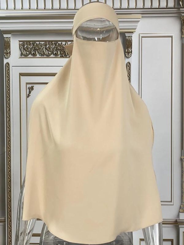 Niqab en soie de médine beige, offrant un style raffiné et un confort absolu