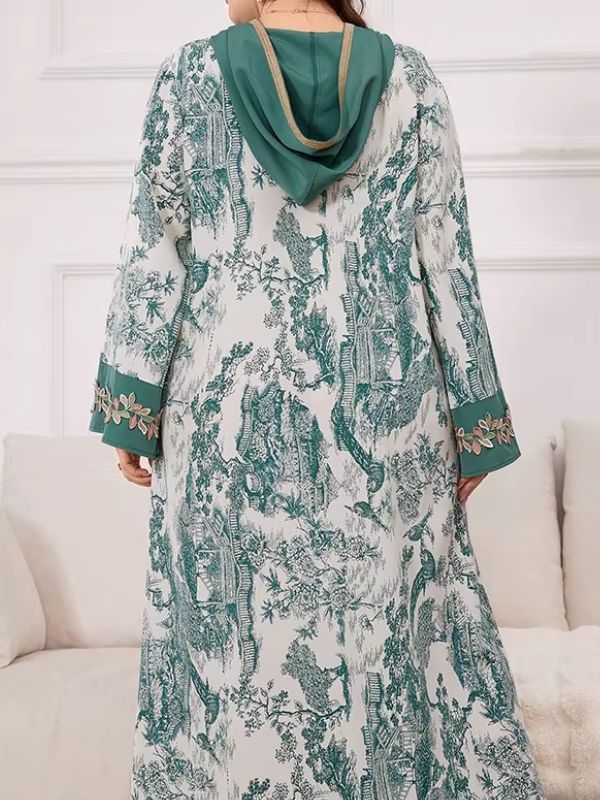 Une femme de dos porte une belle djellaba verte