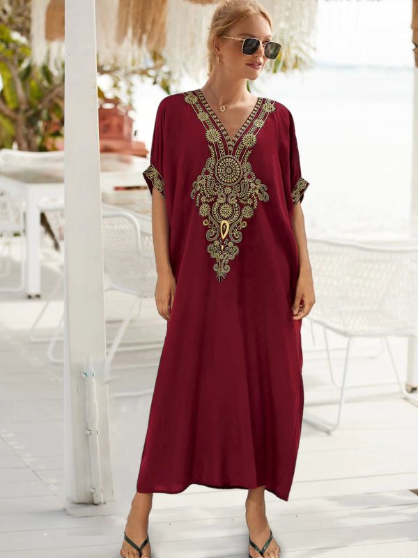 Robe djellaba rouge rubis avec un décolleté en V